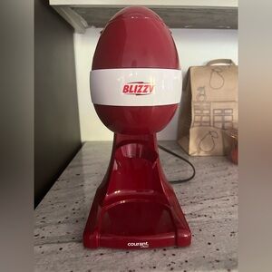 Courant Blizzy Red Snow Cone Maker. Used a few times.